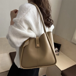 Large khaki leather tote bag for women with floral scarf detail and shoulder strap
