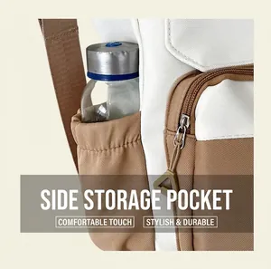 Detail view of a spacious school bag side pocket with a water bottle and elastic closure
