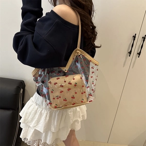 High-capacity transparent PVC tote bag with red cherry patterns and inner pouch
