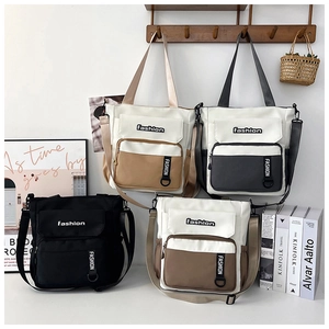 Collection of large capacity tote bags in four colors for commuting and school