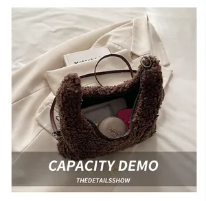 Interior view showing the storage capacity of this brown plush teddy shoulder bag