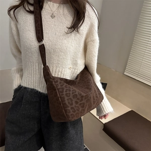 Large leopard print crossbody bag in soft plush fabric for casual autumn winter styling