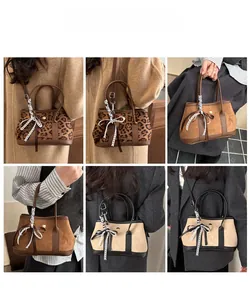 Sacs à main chic en léopard et suédine avec détails de ruban à nœud rayé élégant