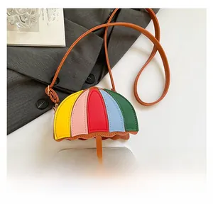 Detailed comparison of multi-color umbrella shaped crossbody bag with a smartphone