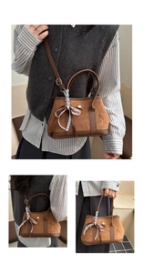 Détails du sac à main marron vintage en daim avec nœud en dentelle et boucle en métal