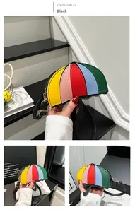 Macro detail of umbrella-shaped crossbody bag featuring vibrant multi-colored panels