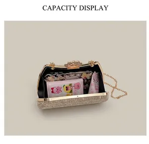Internal capacity view of champagne gold evening clutch bag with sequined box design