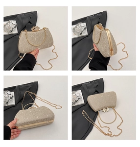 Detail view of champagne lace evening bag with floral diamond buckle and gold chain