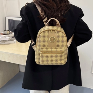 Fashionable beige mini backpack for women with M-letter pattern and leather finish