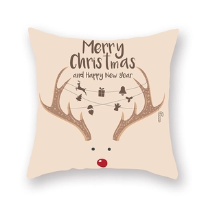 Détail de la housse de coussin de Noël avec motif renne et texte Merry Christmas