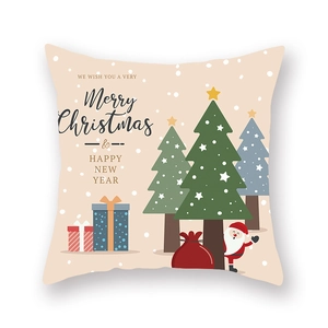 Détail de la taie d'oreiller de Noël avec imprimés Père Noël et sapin sur tissu peau de pêche
