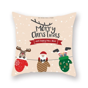 Détail de la taie d'oreiller de Noël avec imprimé Père Noël et renne sur le tissu