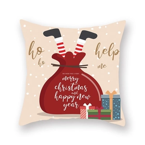 Détail de la taie d'oreiller de Noël en peau de pêche avec motif de sac de cadeaux