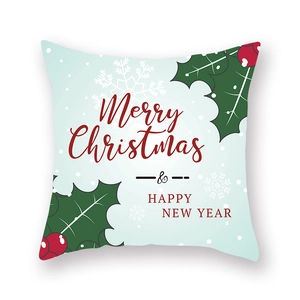Détail de la taie d'oreiller de Noël avec texte Merry Christmas et motif houx