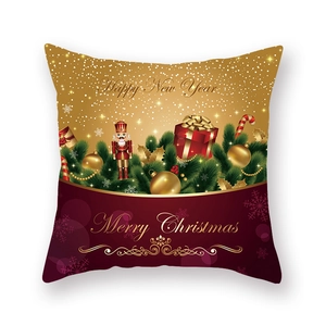 Détail de la taie d'oreiller de Noël en satin avec casse-noisette et motifs dorés festifs
