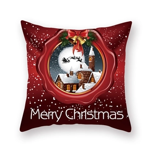 Vue détaillée d'une taie d'oreiller de Noël rouge avec texte Merry Christmas et décor de neige