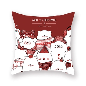 Détail de l'imprimé ours polaire sur la taie d'oreiller de Noël rouge et blanche festive