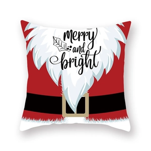 Gros plan de l'imprimé Merry and Bright sur taie d'oreiller de Noël style Père Noël