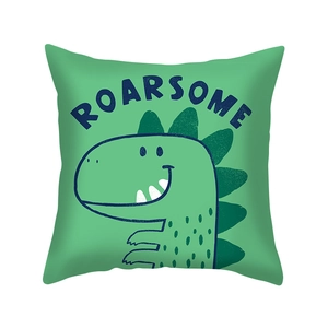 Close-up of green cartoon dinosaur pillowcase with Roarsome text in soft peach skin fabric