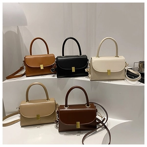 Detailed arrangement of structured leather crossbody bags in five neutral color options