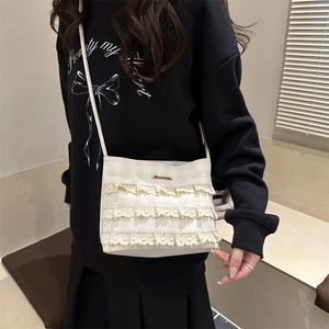 Elegante borsa a tracolla beige con pizzo e motivo testurizzato per moda femminile