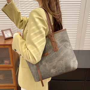 Retro canvas tote bag with brown leather trim and large capacity for daily commuting
