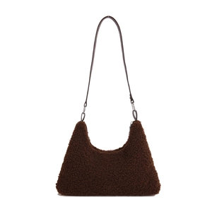 Brown fluffy faux shearling shoulder bag with leather strap on white background
