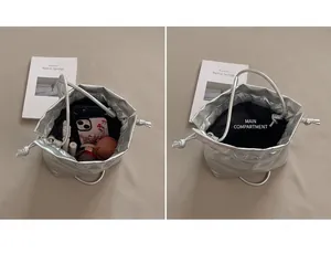 Internal view of silver drawstring makeup bag showing large main compartment capacity