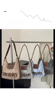 Detail of vintage canvas backpacks in four colors with leather flaps and letter patches