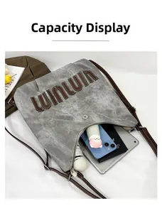 Large capacity grey tote showing storage for tablets, phones, and daily essentials
