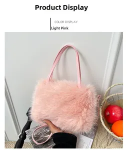 Detailed texture of light pink faux fur handbag with soft plush finish and slim leather handles