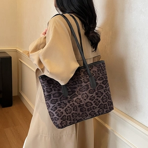 Large capacity leopard print tote bag for women with black straps and stylish purple tones