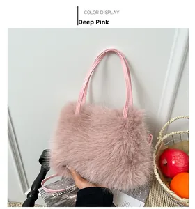 Close-up of a dark pink faux fur handbag with soft texture and leather handles
