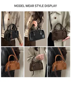 Diverse visuali della borsa Boston vintage in pelle indossata a tracolla e a mano