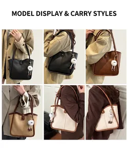 Detailed view of the large PU leather tote bag with a decorative plush doll charm