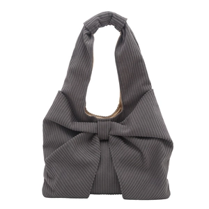 Grey corduroy tote bag with large bow design and vintage casual shoulder straps