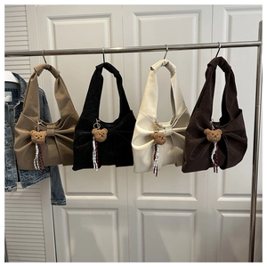 Corduroy tote bags with bow design and teddy bear charms in four assorted colors