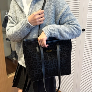 Fashionable leopard print tote bag for women featuring gold New York lettering for daily commute
