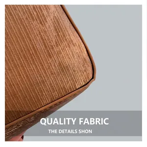 Close-up of brown corduroy fabric texture and fine stitching on the shoulder bag