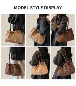 Detail view of large minimalist tote bags in earth tones with stylish leather straps