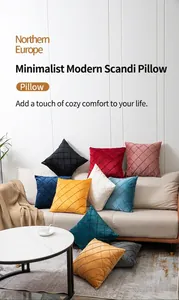 Detail showing quilted diamond patterns on velvet cushion covers in multiple colors