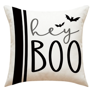 Detail of linen Halloween pillowcase with hey BOO text and black bat silhouette print