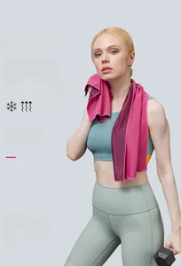 Detail of pink and purple cooling sports towel with breathable honeycomb texture
