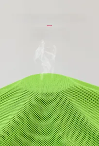 Macro shot showing breathable honeycomb mesh texture of quick-dry cooling sports towel