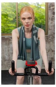 Close-up of a dark grey quick-dry sports towel worn by a person on a gym bike