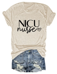 Flat lay of beige cotton NICU nurse t-shirt paired with denim shorts for casual style