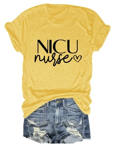 Flat lay of a yellow NICU nurse T-shirt with denim shorts on a clean white background