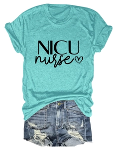 Flat lay of a NICU nurse t-shirt paired with distressed denim shorts on white background