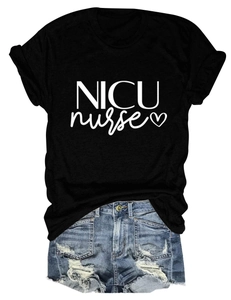 Flat lay of black NICU nurse cotton T-shirt paired with distressed blue denim shorts