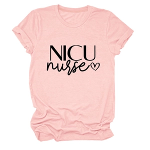 Detail of rolled sleeve cuff and NICU nurse heart print on pink cotton T-shirt